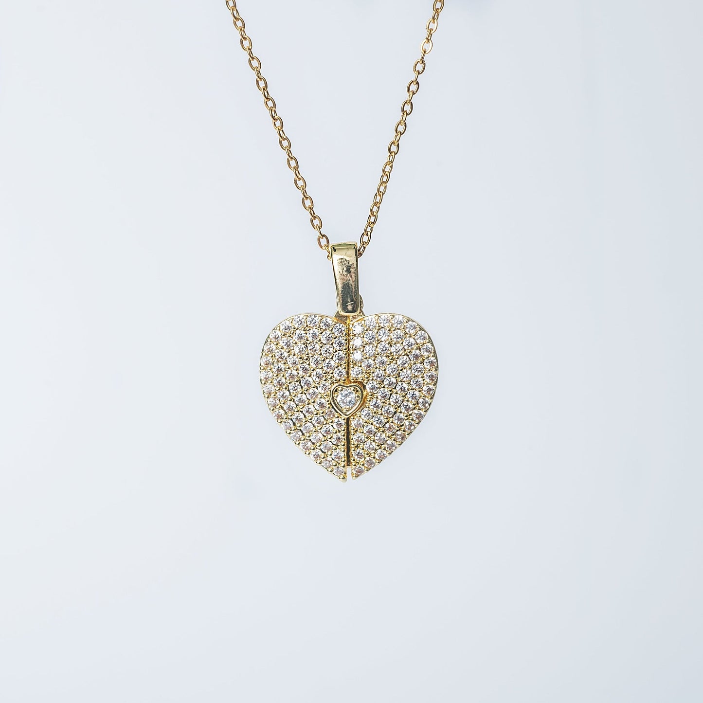 Elegant gold open close heart necklace